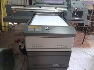 may-in-uv-phang-6090-gia-bao-nhieu (1)